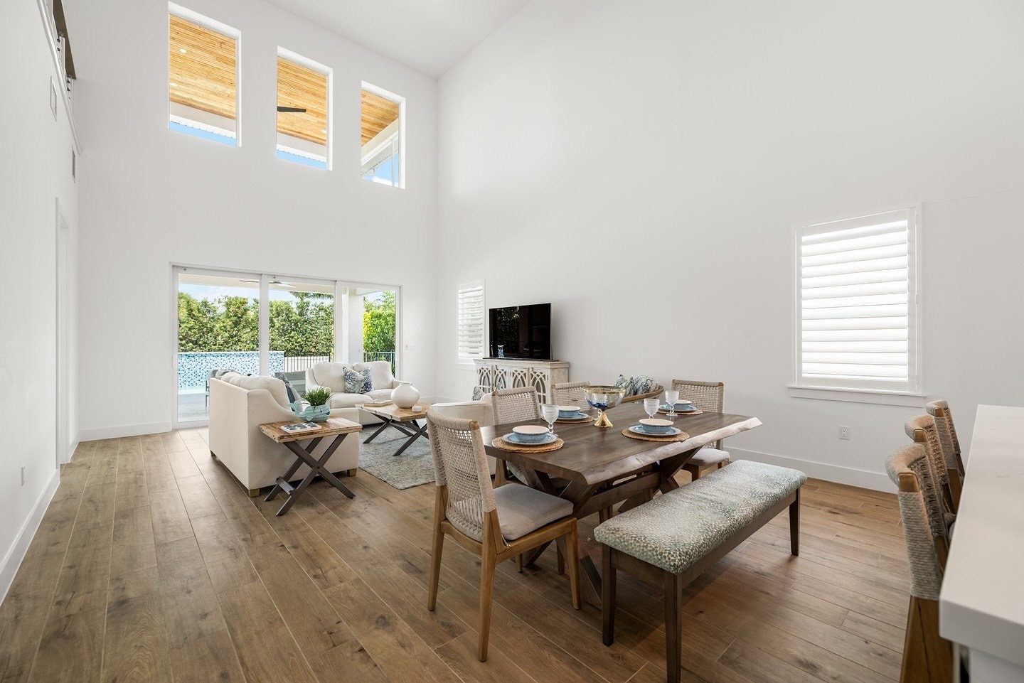 Double-height living and dining room with clerestory windows