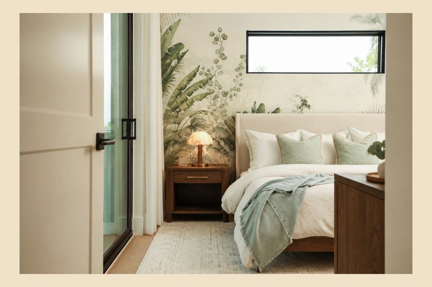 Calm guest bedroom with botanical wall treatment