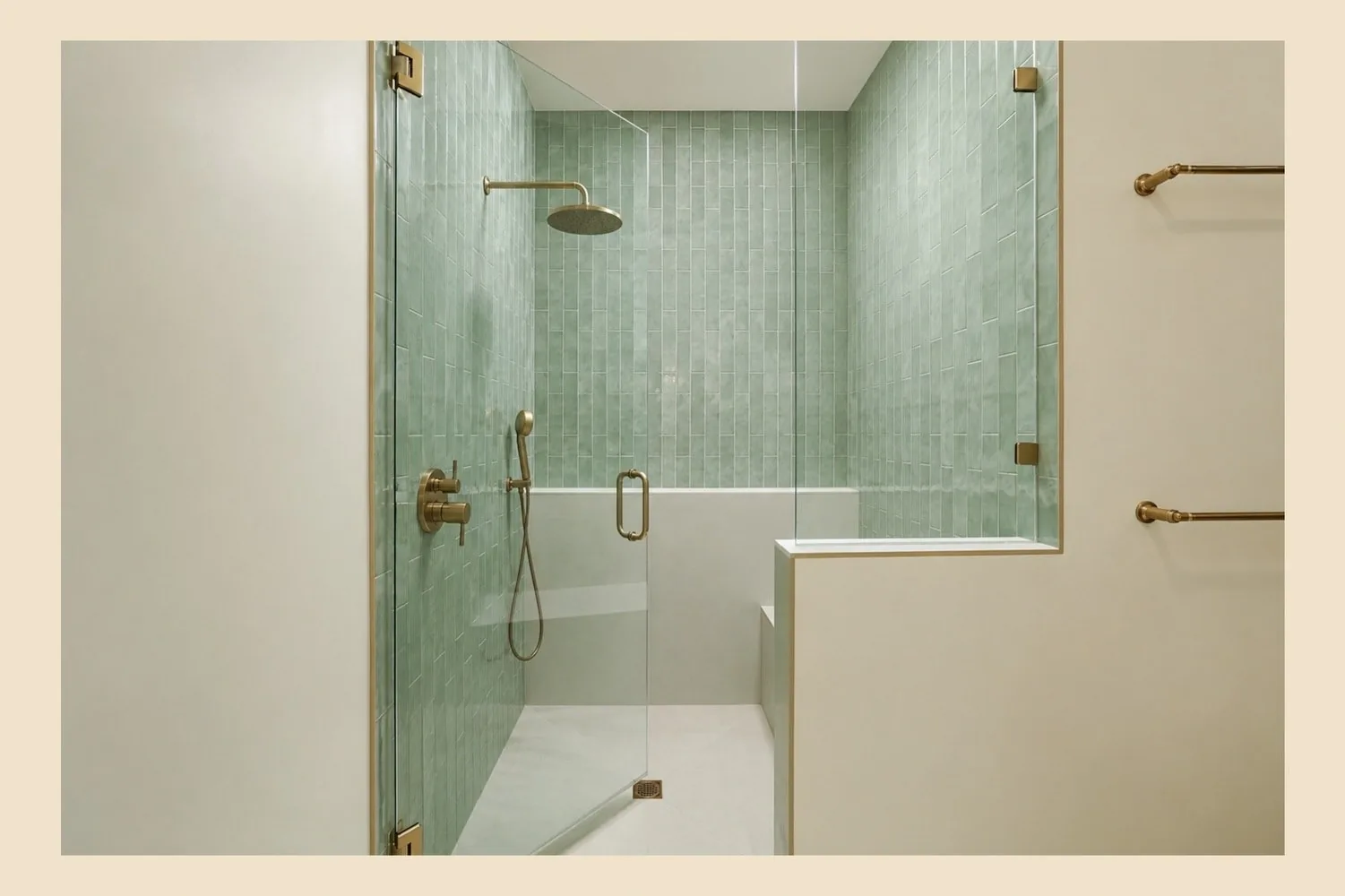 Walk-in shower finished in soft green tile